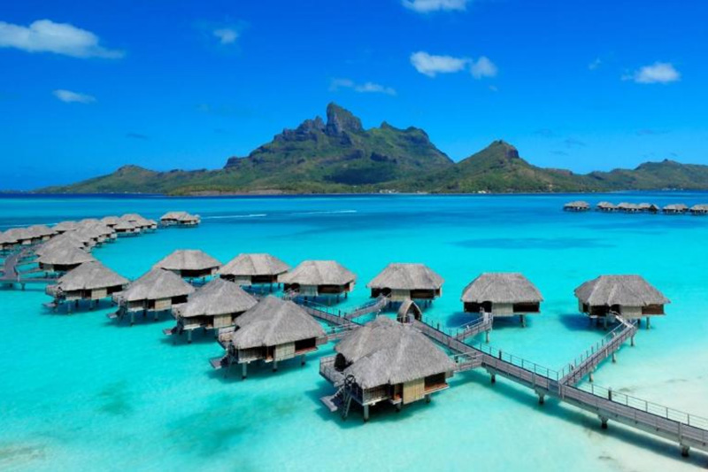 french polynesia huts over water