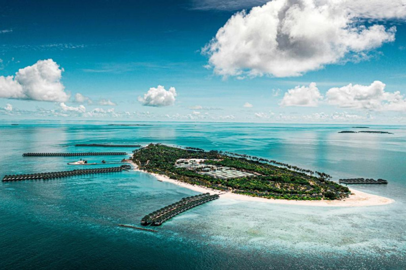 Maldives water villas with pool and slide